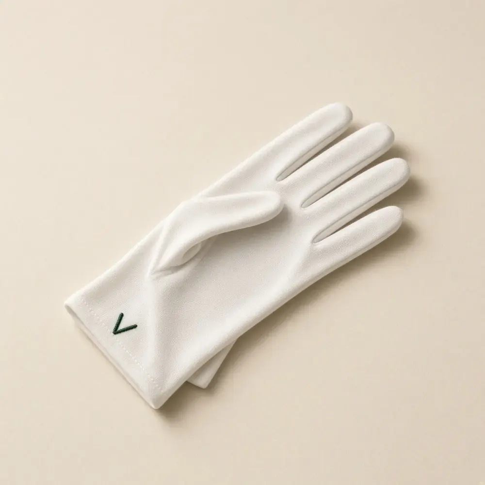 White glove with green V mark